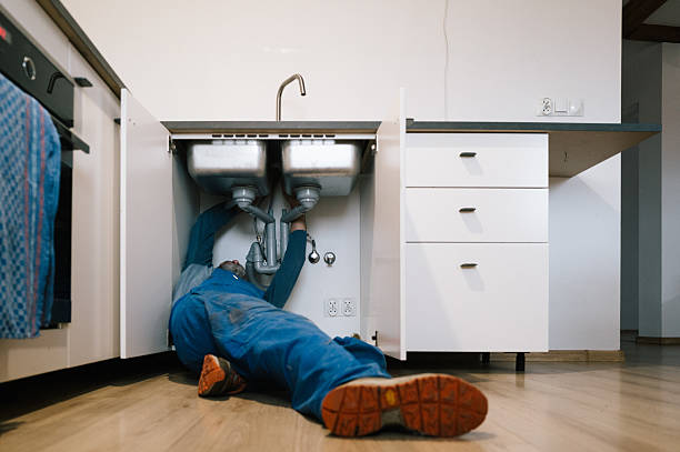 Professional Emergency Plumber technician working in Bohemia, NY